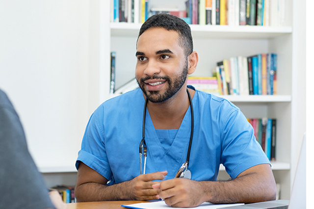 Doctor chatting to patient