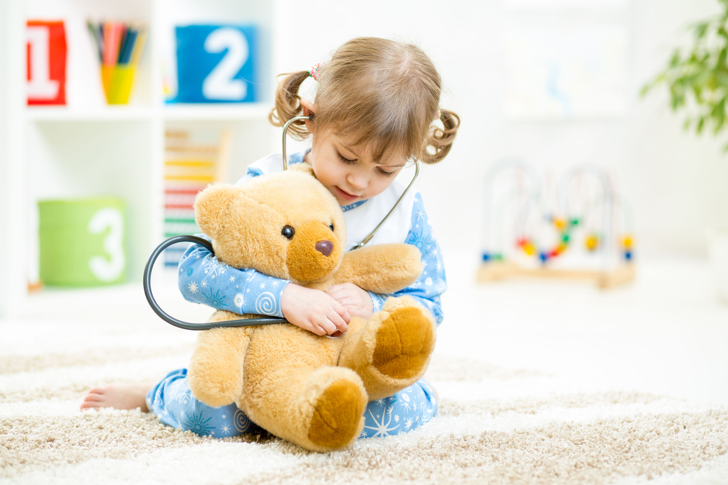 Child with teddy bear