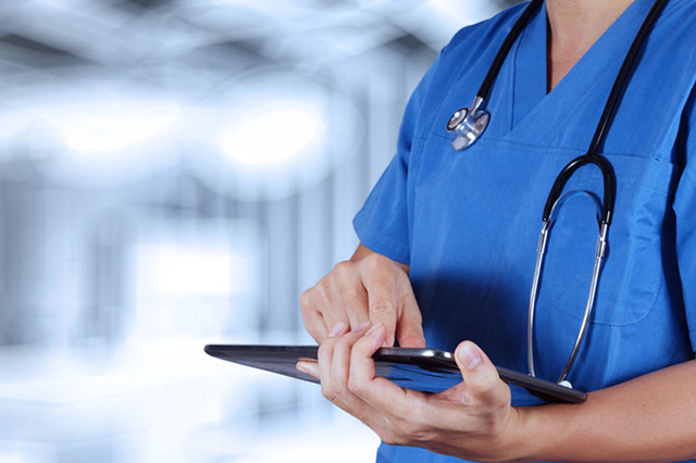 Nurse with electronic tablet